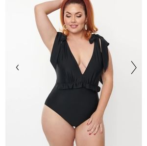 Unique vintage black one piece